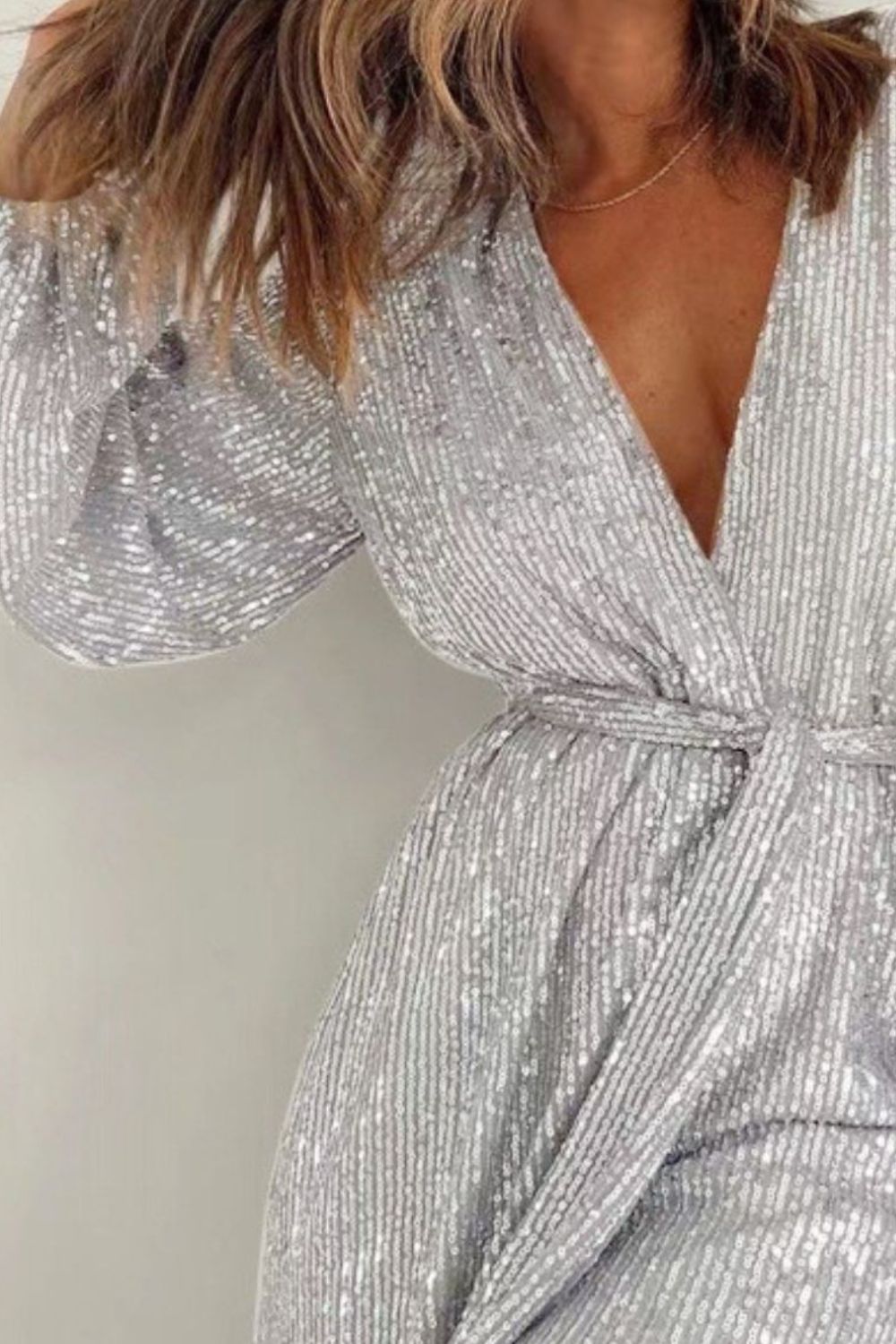 Full Size Sequin Surplice Tie Waist Long Sleeve Romper | Sugarz Chique Boutique