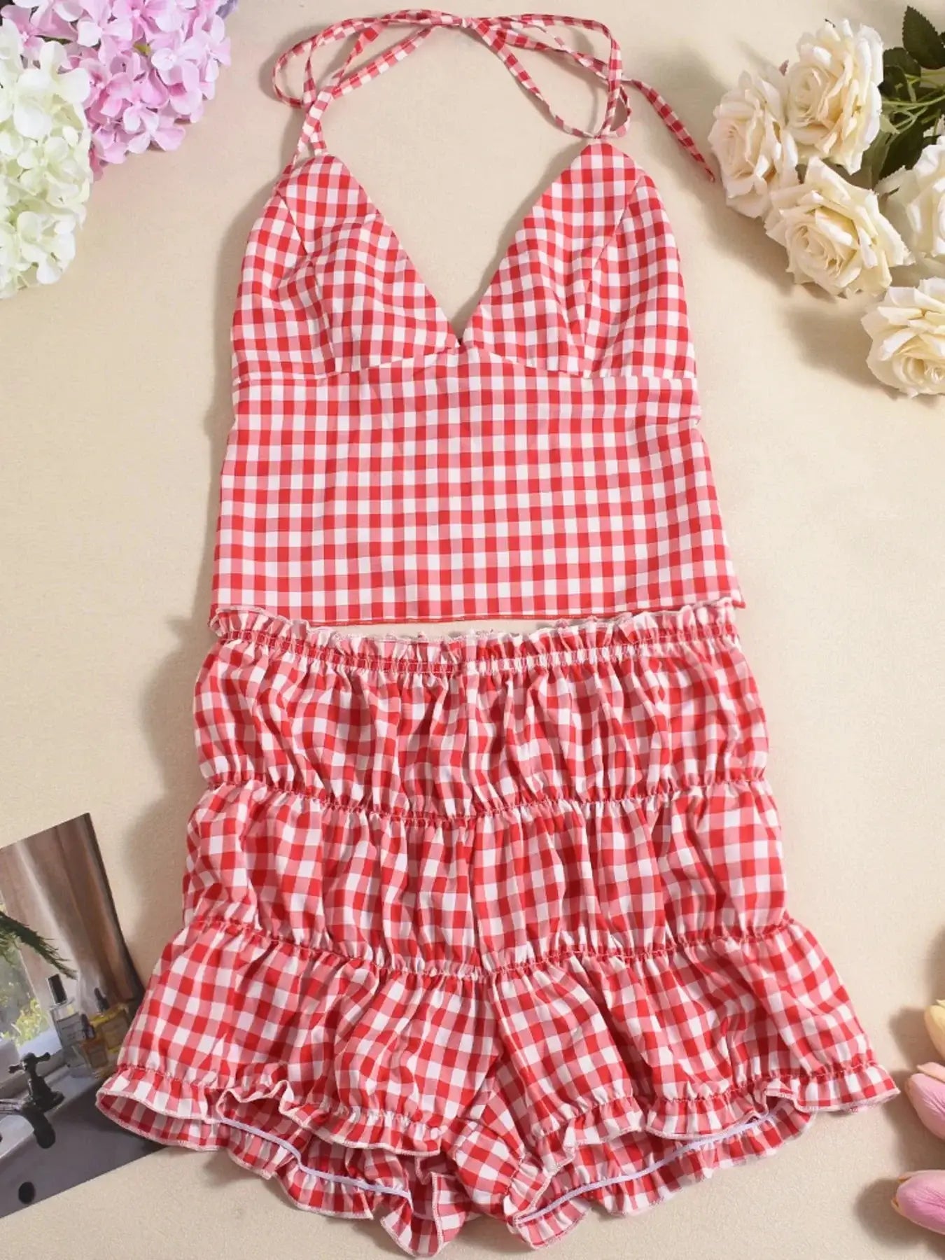 Plaid halter neck cami and shorts set featuring a tied back and ruched design, perfect for summer wear.
