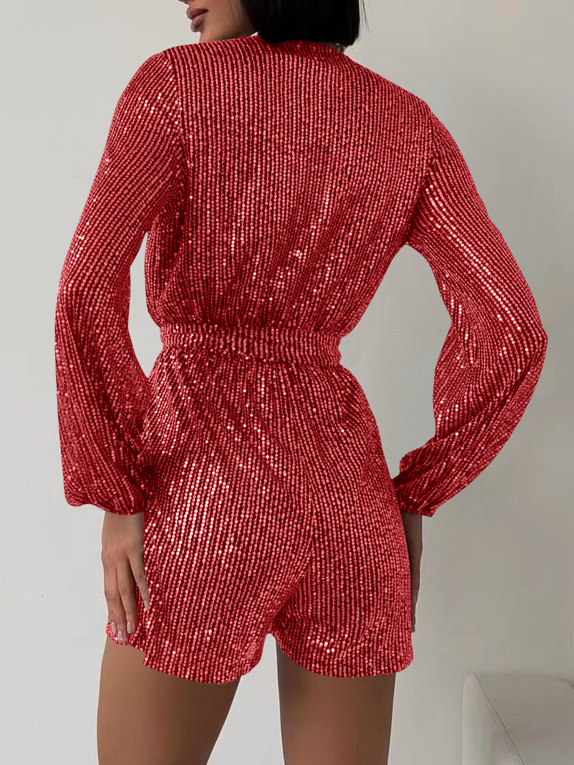 Full Size Sequin Surplice Tie Waist Long Sleeve Romper | Sugarz Chique Boutique
