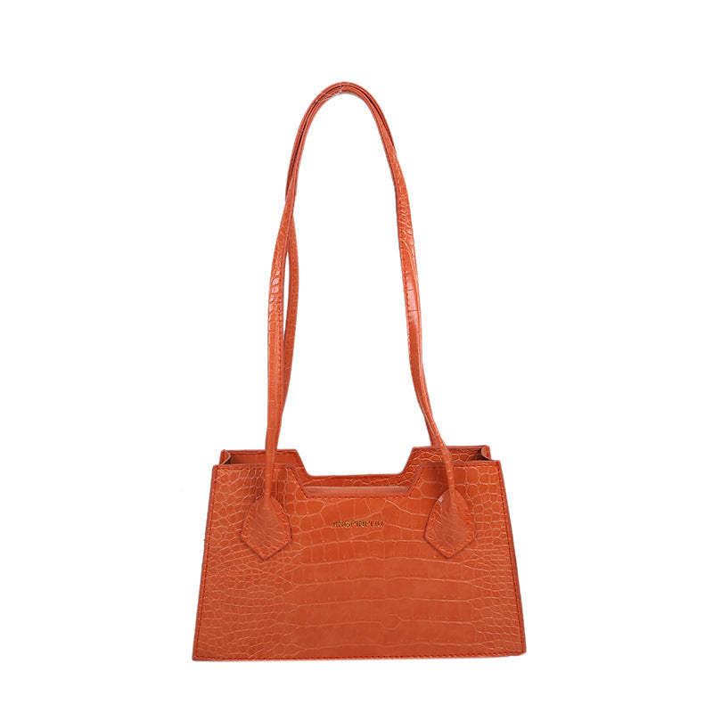 Stylish compact handbag with minimalist square silhouette