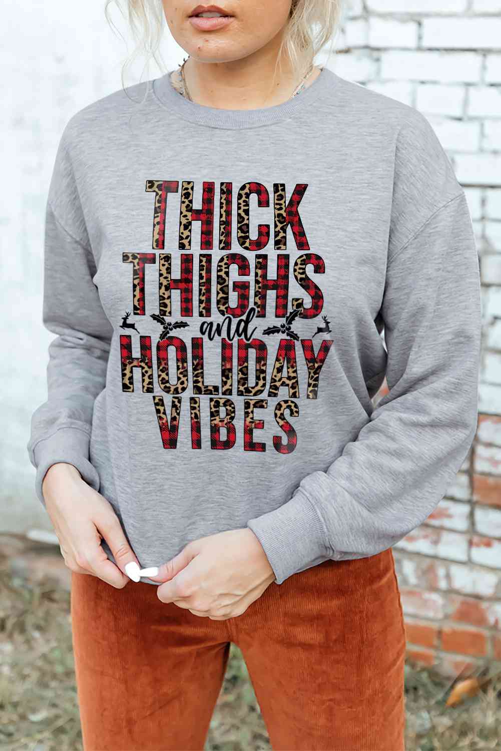 Graphic Dropped Shoulder Round Neck Sweatshirt | Sugarz Chique Boutique