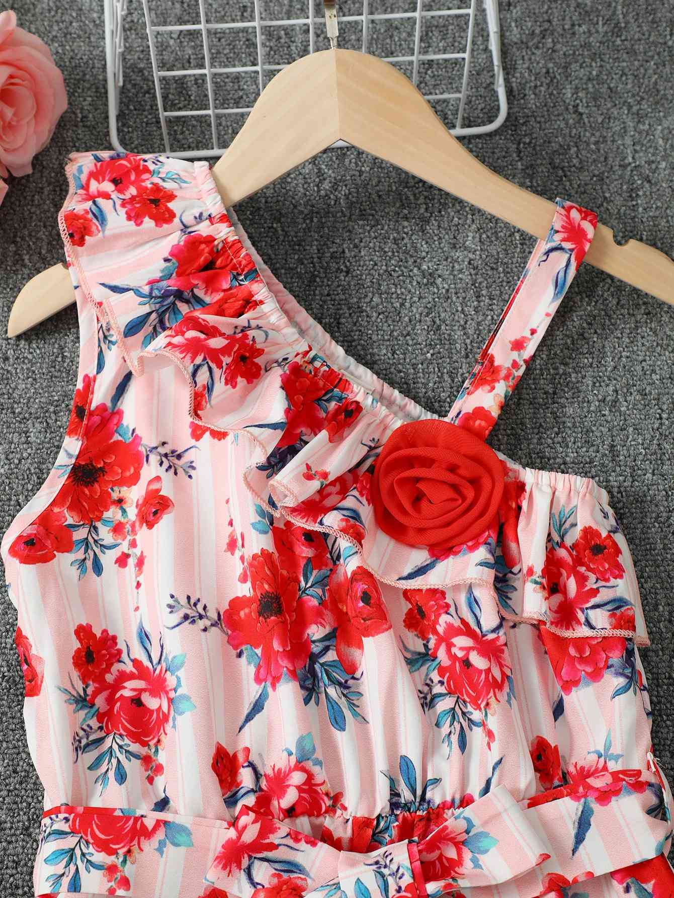 Floral Asymmetrical Neck Tie Belt Jumpsuit | Sugarz Chique Boutique