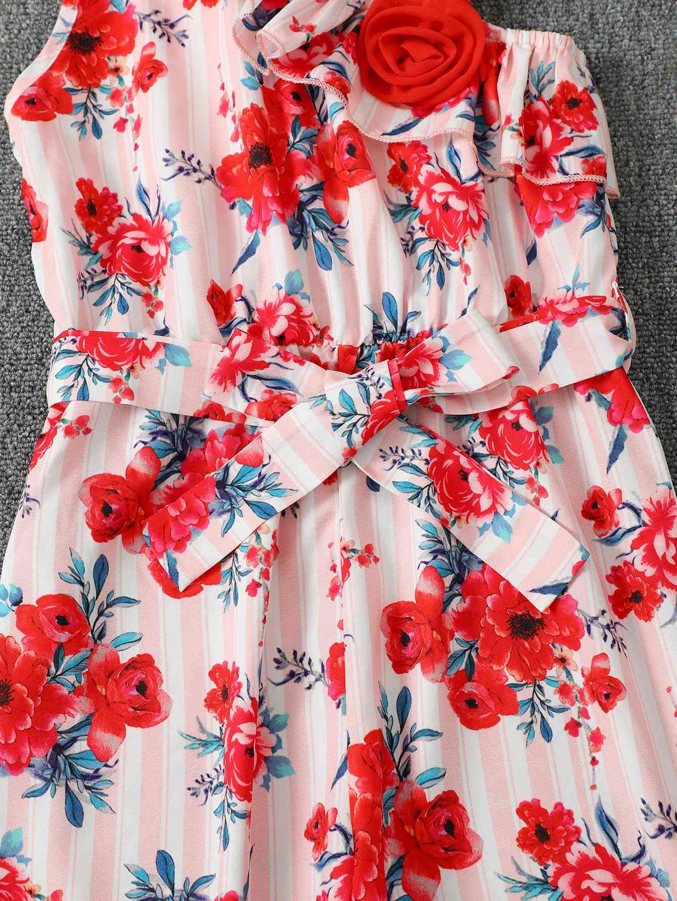 Floral Asymmetrical Neck Tie Belt Jumpsuit | Sugarz Chique Boutique