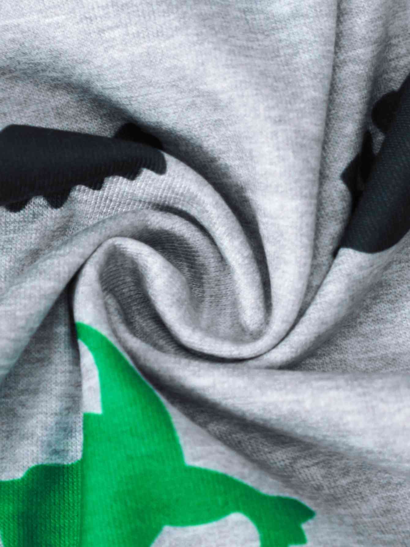 Dinosaur Print Round Neck Tee | Sugarz Chique Boutique