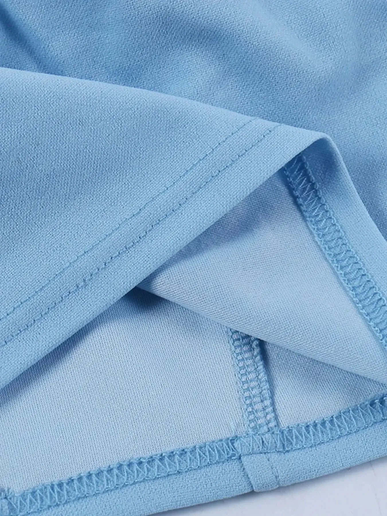 Close-up of the blue fabric showing stitches and structure of a Sweetheart Neck Tube Top, highlighting comfort and quality.