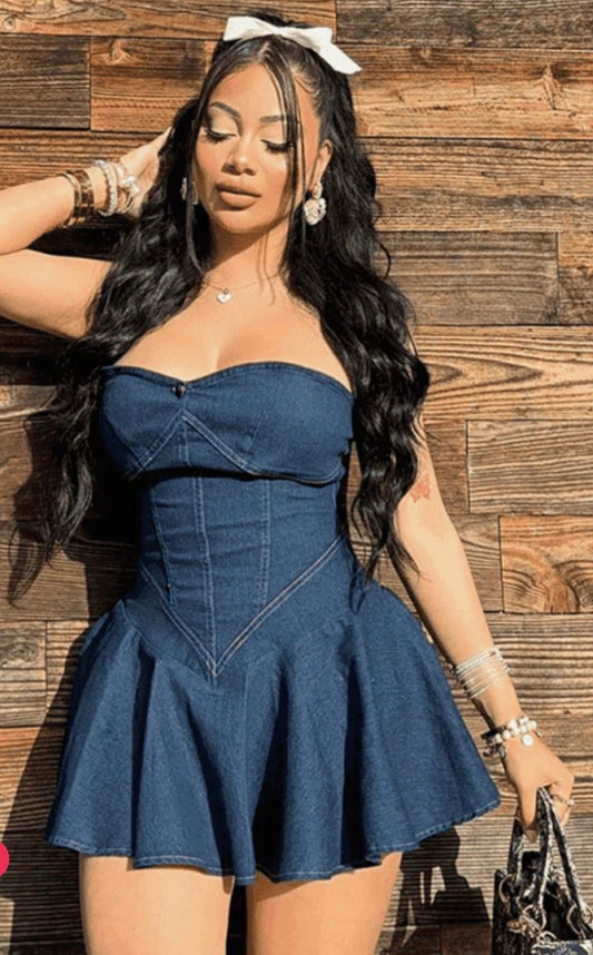 Blue solid tube top midi dress from Sugarz Chique Boutique, featuring a fitted sleeveless design and midi length for elegant styling.