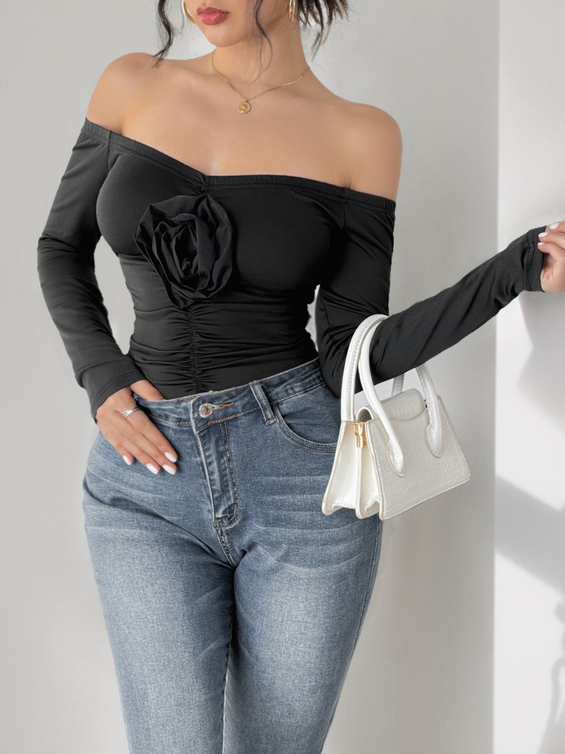 Perfee Ruched Flower Off-Shoulder Long Sleeve Bodysuit | Sugarz Chique Boutique