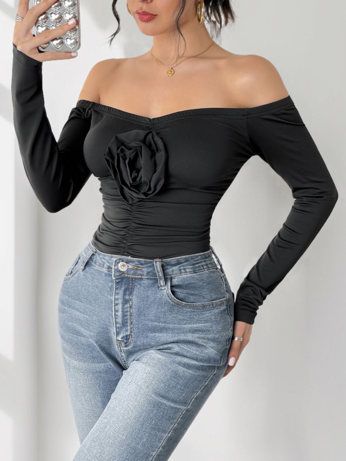 Perfee Ruched Flower Off-Shoulder Long Sleeve Bodysuit | Sugarz Chique Boutique