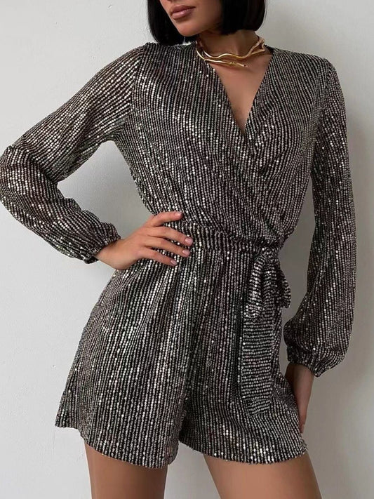 Full Size Sequin Surplice Tie Waist Long Sleeve Romper | Sugarz Chique Boutique