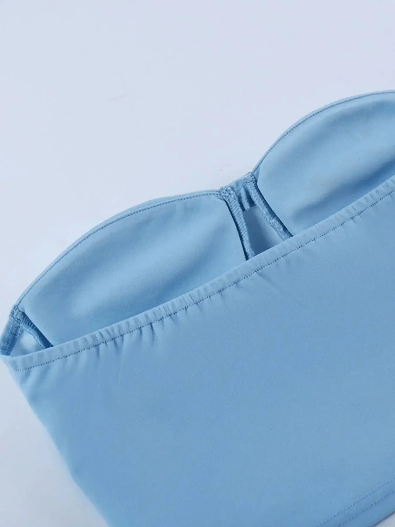 Light blue sweetheart neck tube top featuring a stretchy material blend of polyester and spandex, perfect for summer outfits.