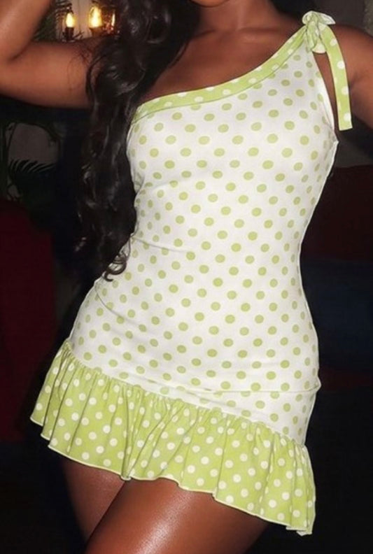 Polka dots one-shoulder dress from Sugarz Chique Boutique, featuring a stylish design and feminine silhouette.