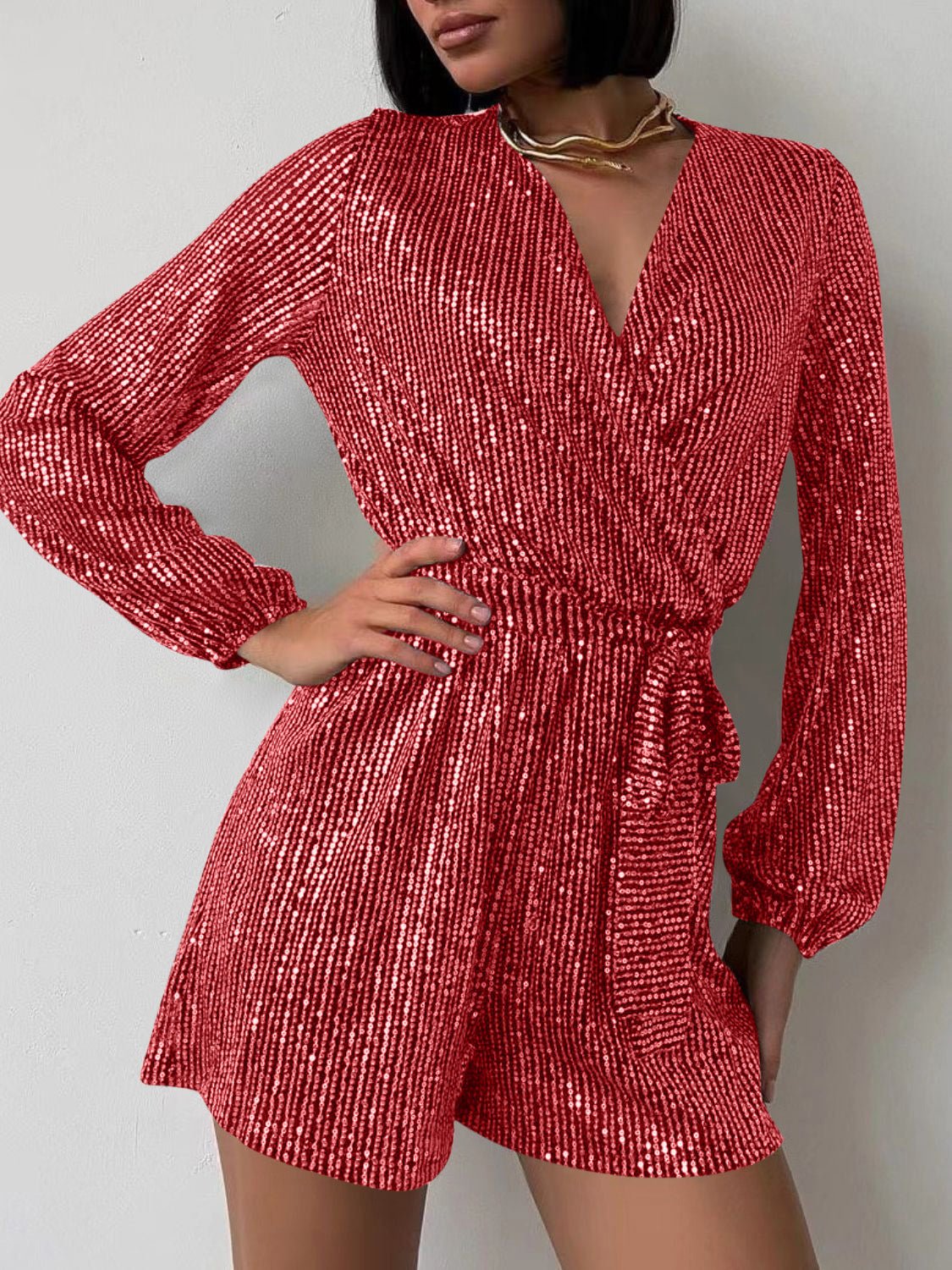 Full Size Sequin Surplice Tie Waist Long Sleeve Romper | Sugarz Chique Boutique