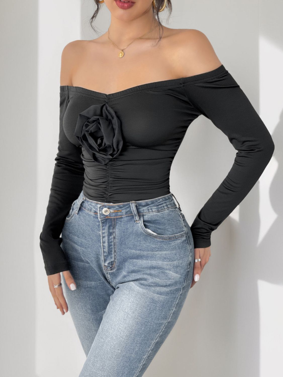 Perfee Ruched Flower Off-Shoulder Long Sleeve Bodysuit | Sugarz Chique Boutique