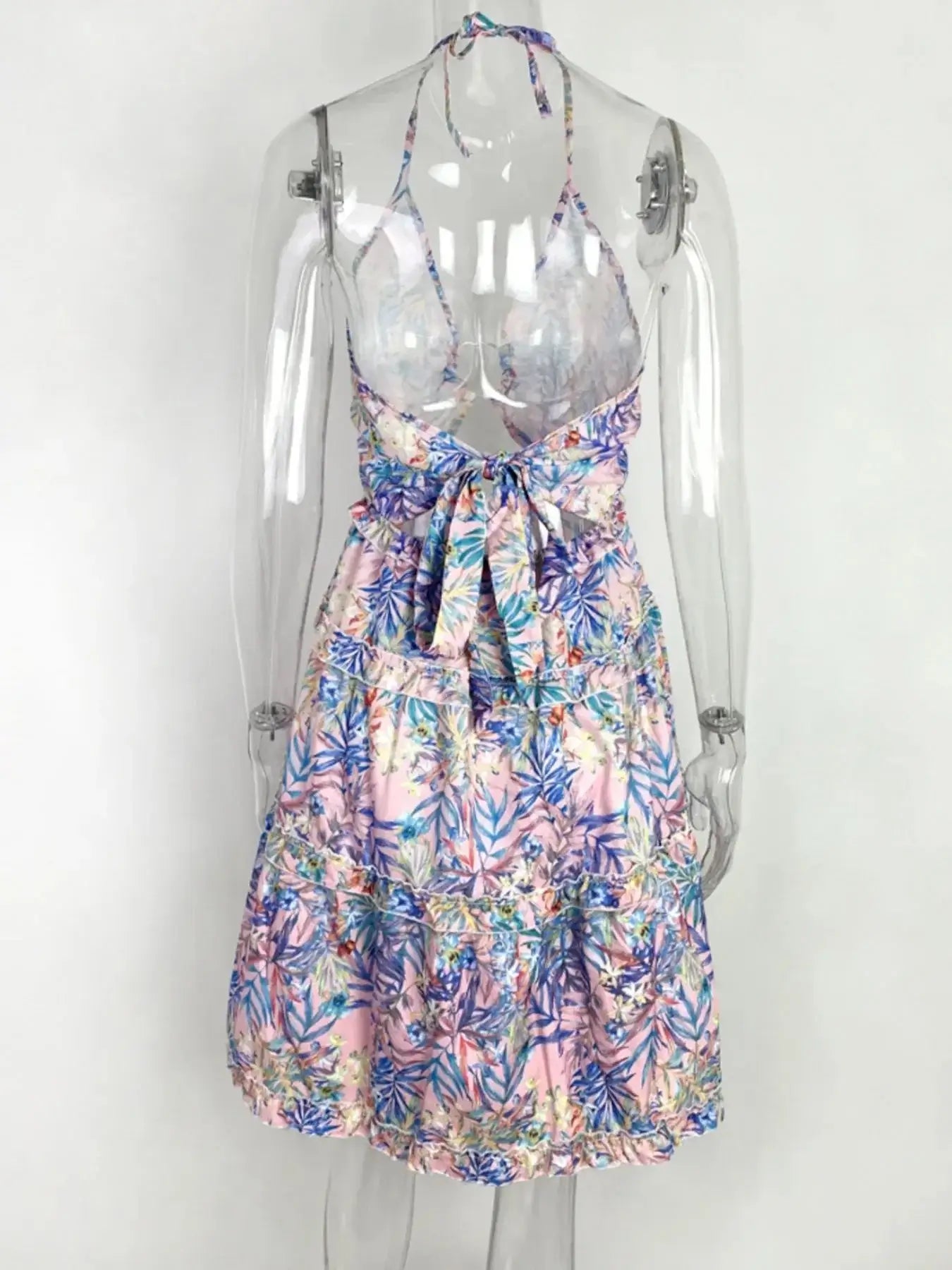 Full size halter neck cami dress with floral print, cutout details, ruffled tiered design, plus size fashion attire.